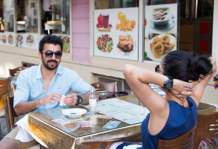 Making that Doner pit stop to boost energy levels. On Manoj Kr : Shades by Armani, Watch by G Shock, Shirt by Kotton