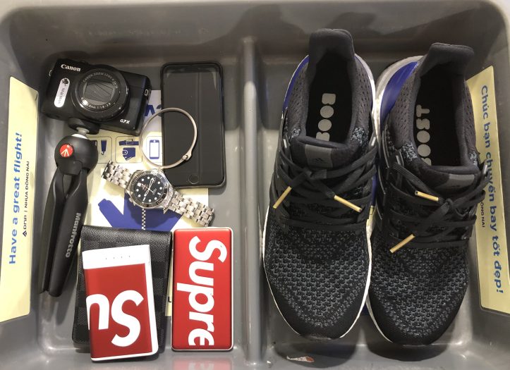 Airport security essentials in a tray